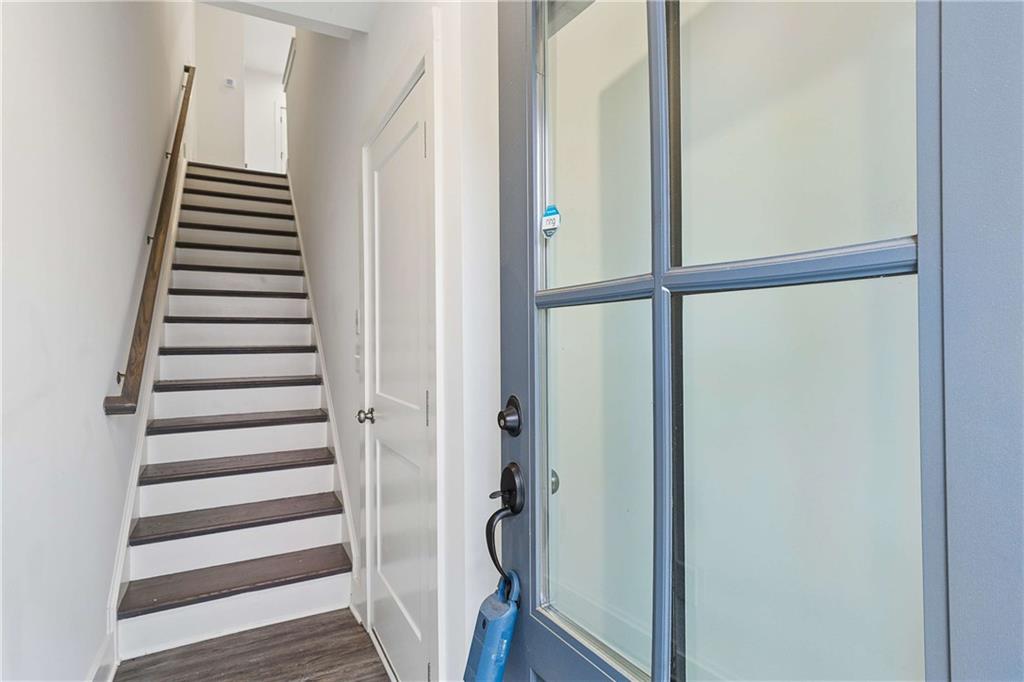 140 Color Circle Atlanta, GA 30317 - Photo 2 of 22 a view of a hallway with wooden floor and entryway