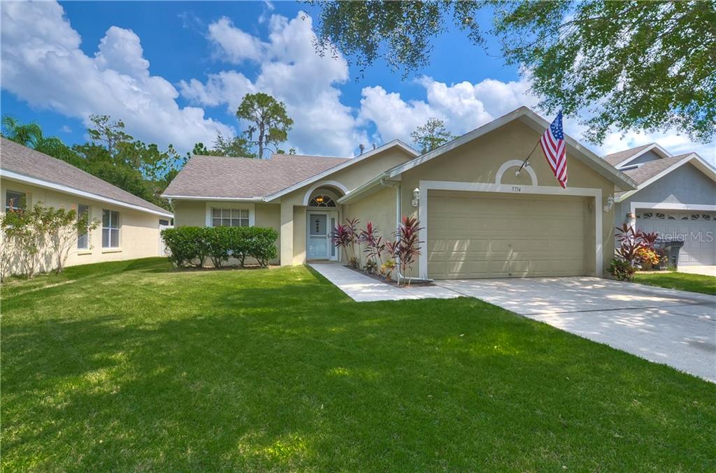 5714 Hawklake Road Lithia, FL 33547 - Photo 1 of 1 Charming well-maintained family home in the coveted neighborhood of FishHawk Ranch!