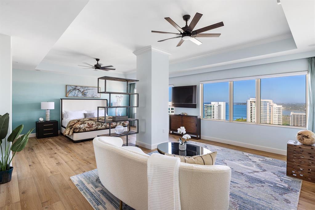 1111 Ritz Carlton Drive, Unit 1803 Sarasota, FL 34236 - Photo 32 of 65 a living room with furniture and a wooden floor