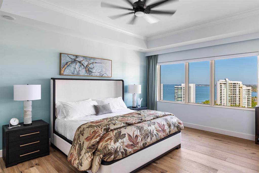 1111 Ritz Carlton Drive, Unit 1803 Sarasota, FL 34236 - Photo 33 of 65 a bedroom with a large bed and a window