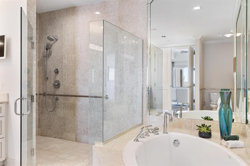 1111 Ritz Carlton Drive, Unit 1803 Sarasota, FL 34236 - Photo 36 of 65 a bathroom with a sink and a shower