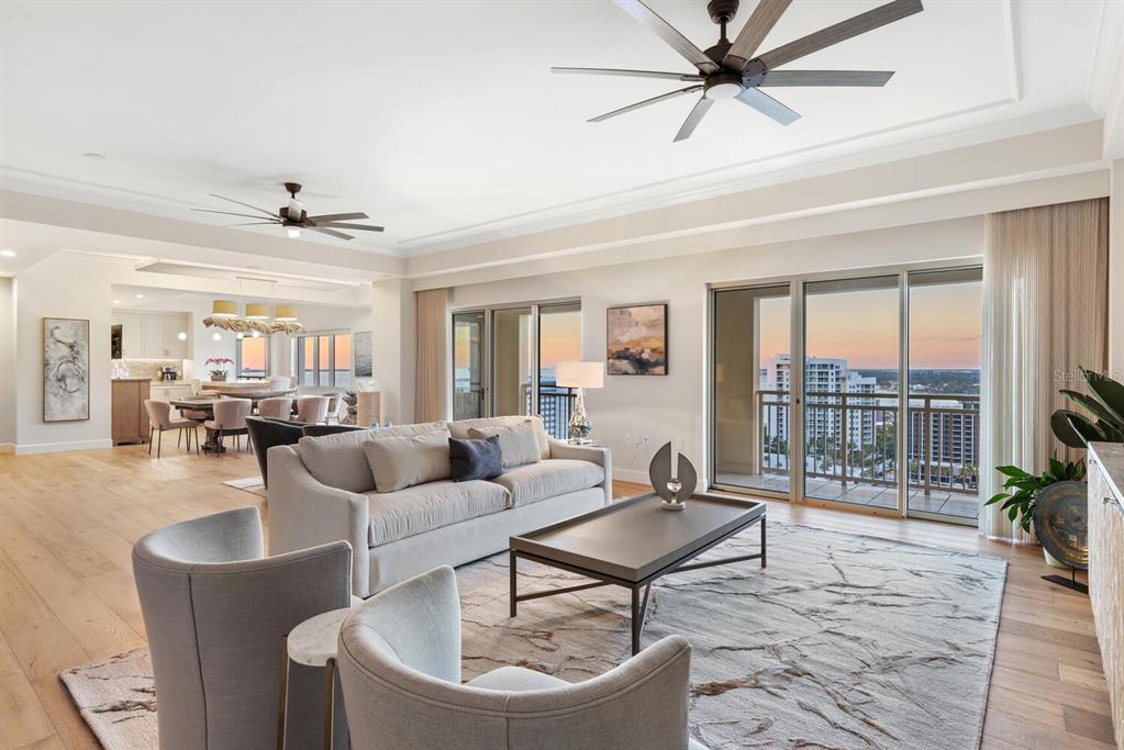 1111 Ritz Carlton Drive, Unit 1803 Sarasota, FL 34236 - Photo 45 of 65 a living room with furniture and a floor to ceiling window