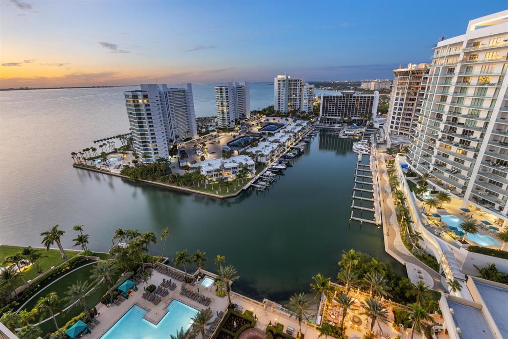 1111 Ritz Carlton Drive, Unit 1803 Sarasota, FL 34236 - Photo 53 of 65 a view of a house with a lake