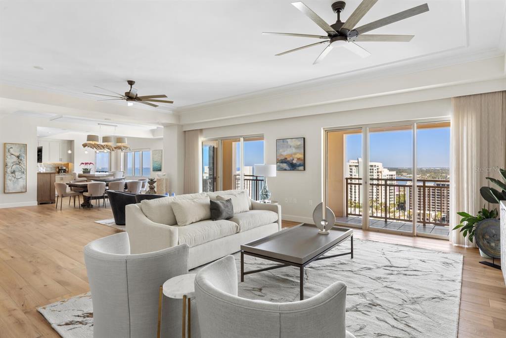 1111 Ritz Carlton Drive, Unit 1803 Sarasota, FL 34236 - Photo 7 of 65 a living room with furniture and a large window