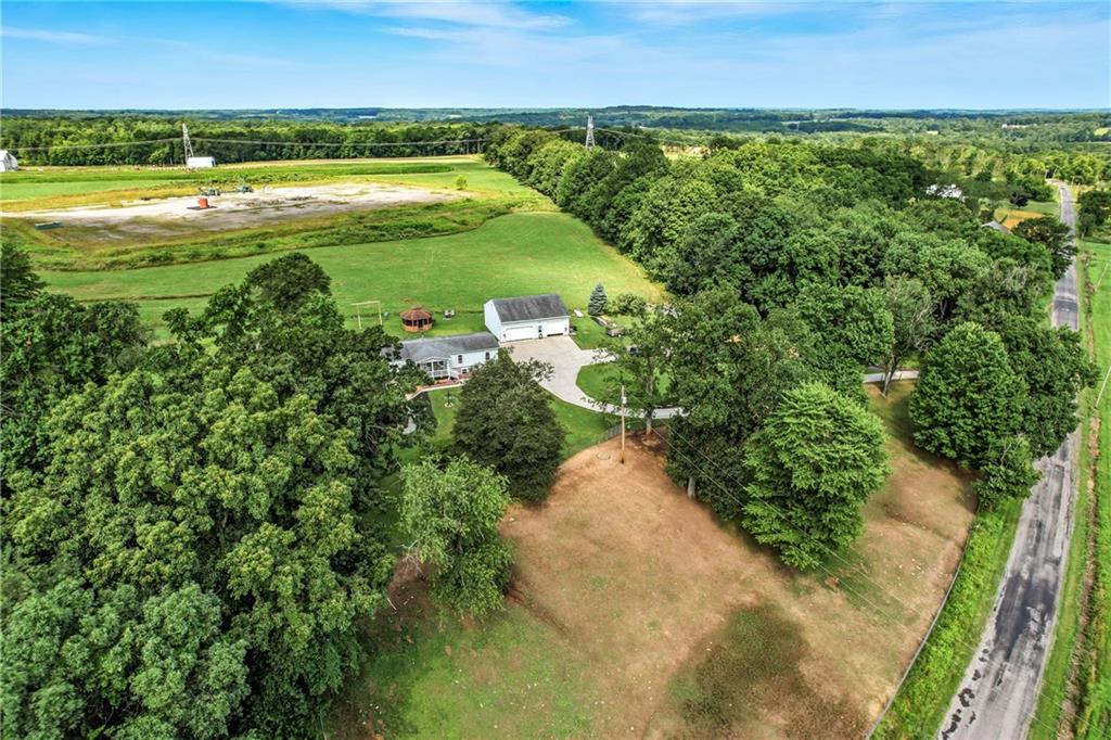 400 Oak Hill Road West Middlesex, PA 16159 - Photo 13 of 41 a view of an outdoor space and a yard