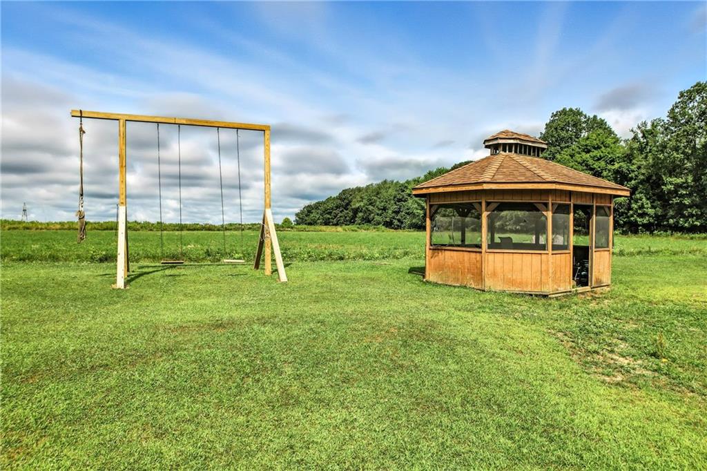 400 Oak Hill Road West Middlesex, PA 16159 - Photo 23 of 41 a view of a house with a backyard