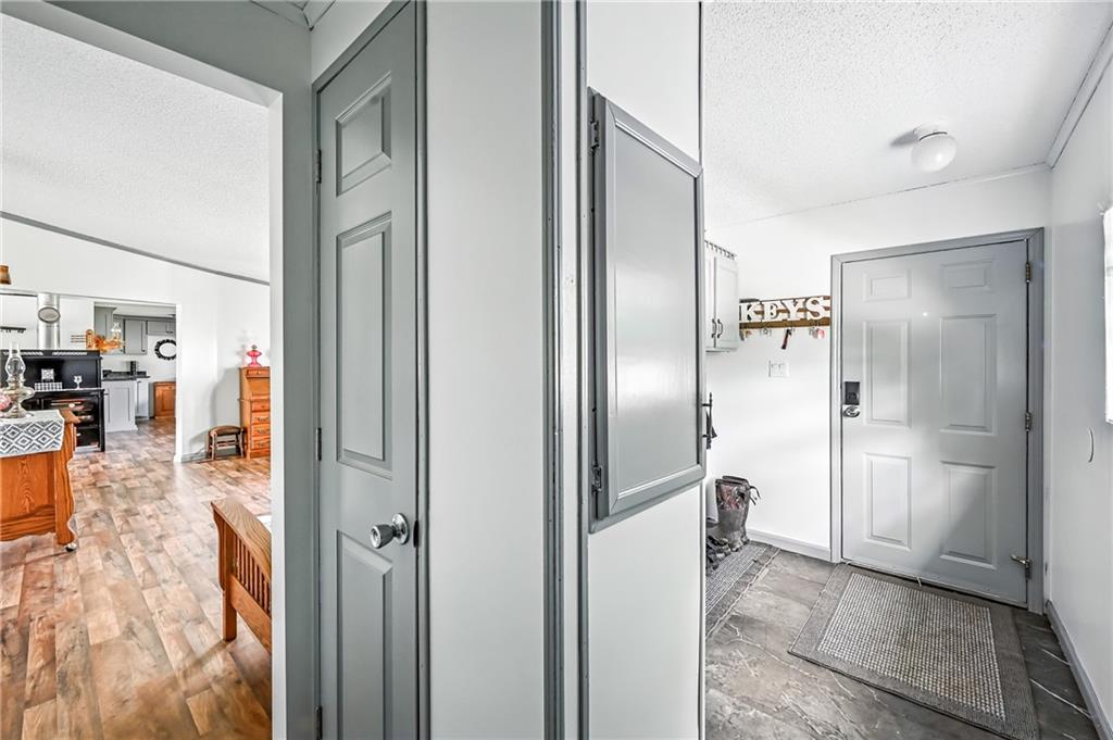 400 Oak Hill Road West Middlesex, PA 16159 - Photo 33 of 41 a view of a kitchen from a hallway