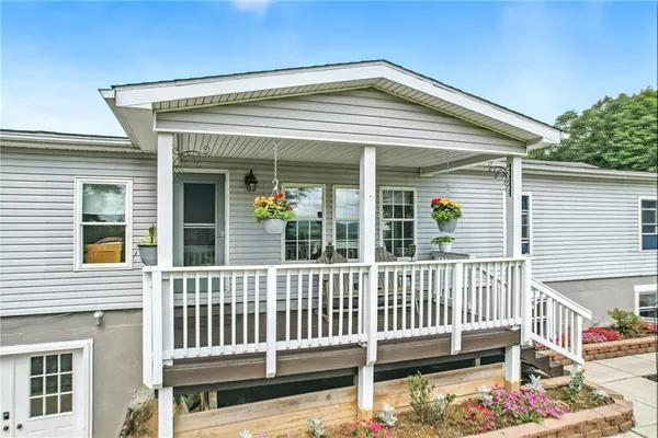 front view of a house with a deck