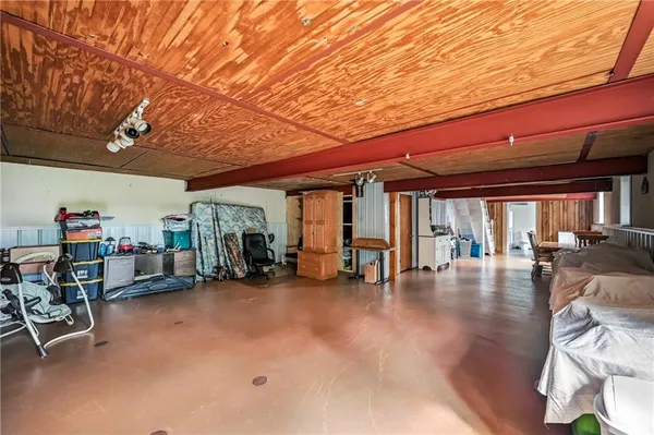 a view of a livingroom with hardwood and a patio
