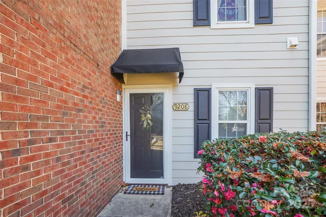 a house with a flower garden