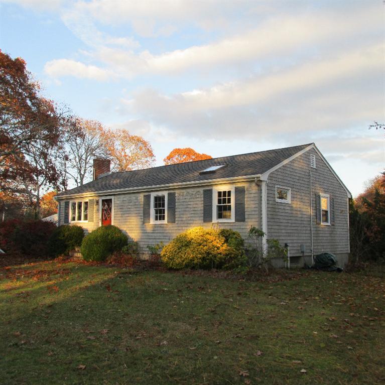 1 Mashnee Road Bourne, MA 02532 - Photo 1 of 29 a view of a house with a yard