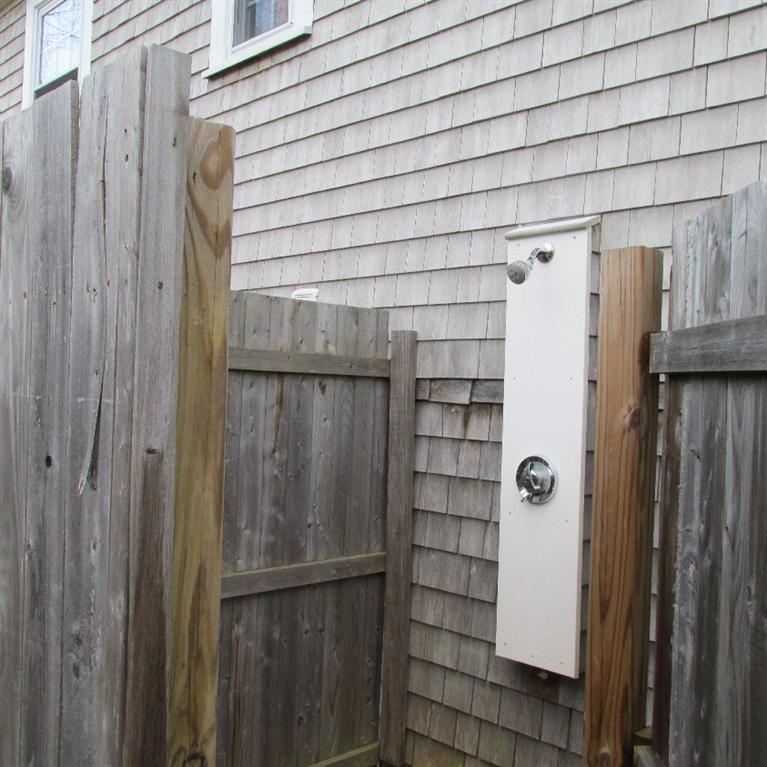 1 Mashnee Road Bourne, MA 02532 - Photo 25 of 29 a bathroom with a shower and a sink