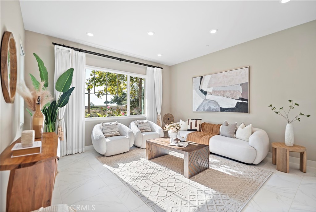 168 Perspective Irvine, CA 92618 - Photo 18 of 62 a living room with furniture and a large window
