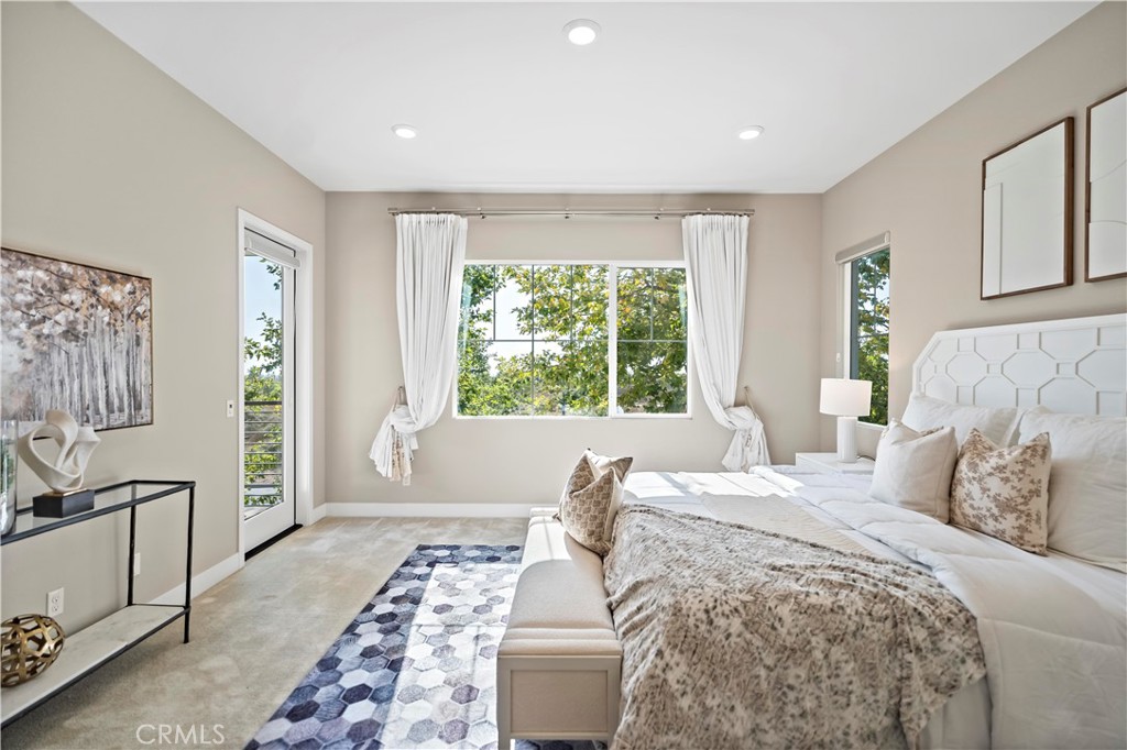 168 Perspective Irvine, CA 92618 - Photo 25 of 62 a bedroom with a large bed and a window