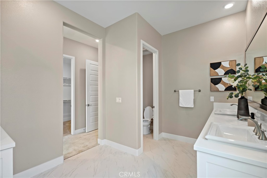 168 Perspective Irvine, CA 92618 - Photo 33 of 62 a view of bathroom with sink and mirror