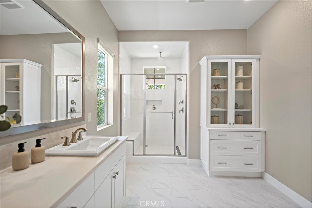 168 Perspective Irvine, CA 92618 - Photo 34 of 62 a bathroom with a granite countertop sink mirror and double