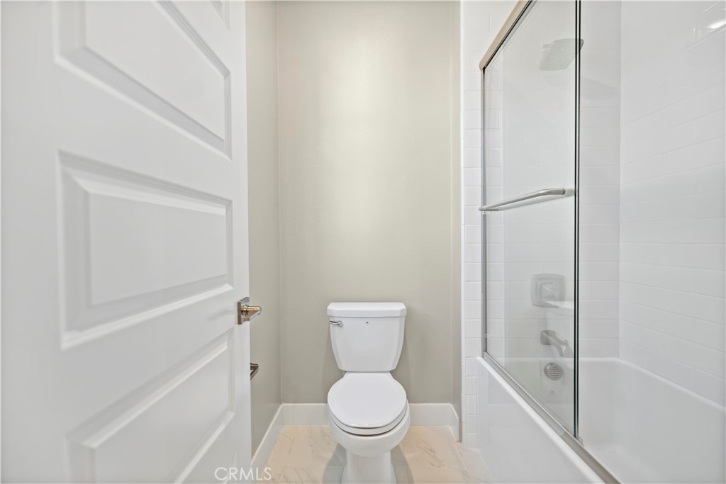 168 Perspective Irvine, CA 92618 - Photo 36 of 62 a bathroom with a toilet and a shower