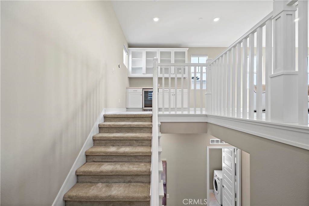 168 Perspective Irvine, CA 92618 - Photo 49 of 62 a view of staircase with white walls and a window