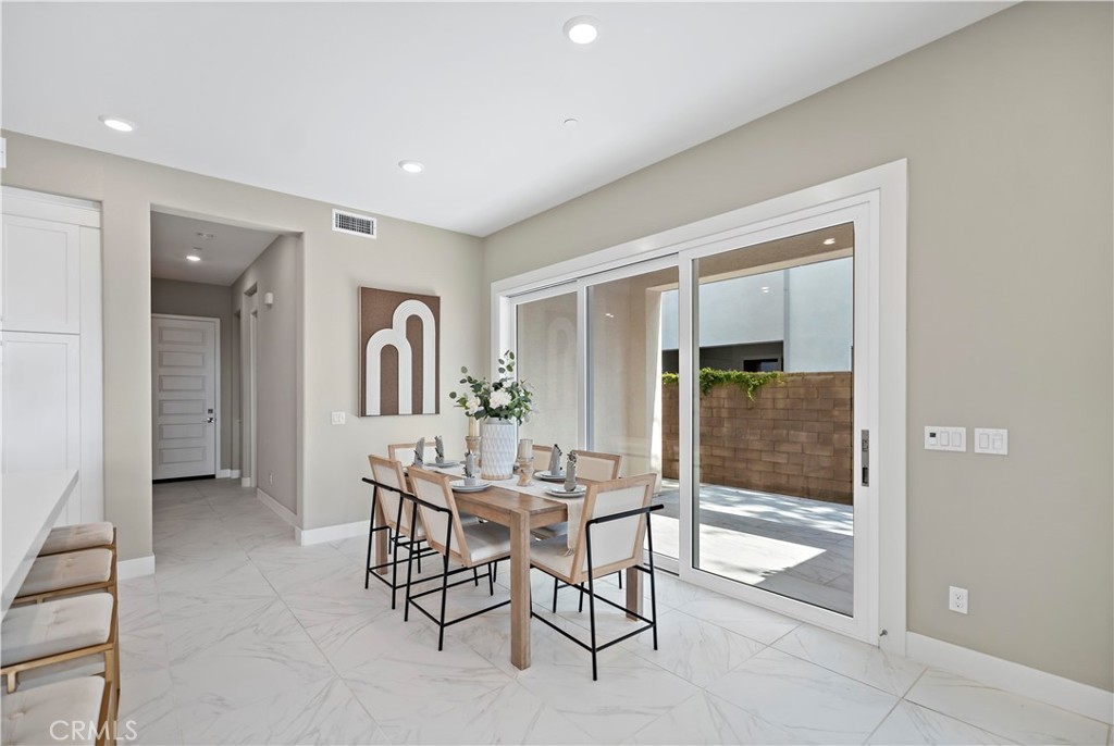 168 Perspective Irvine, CA 92618 - Photo 8 of 62 a view of a livingroom with furniture and entryway