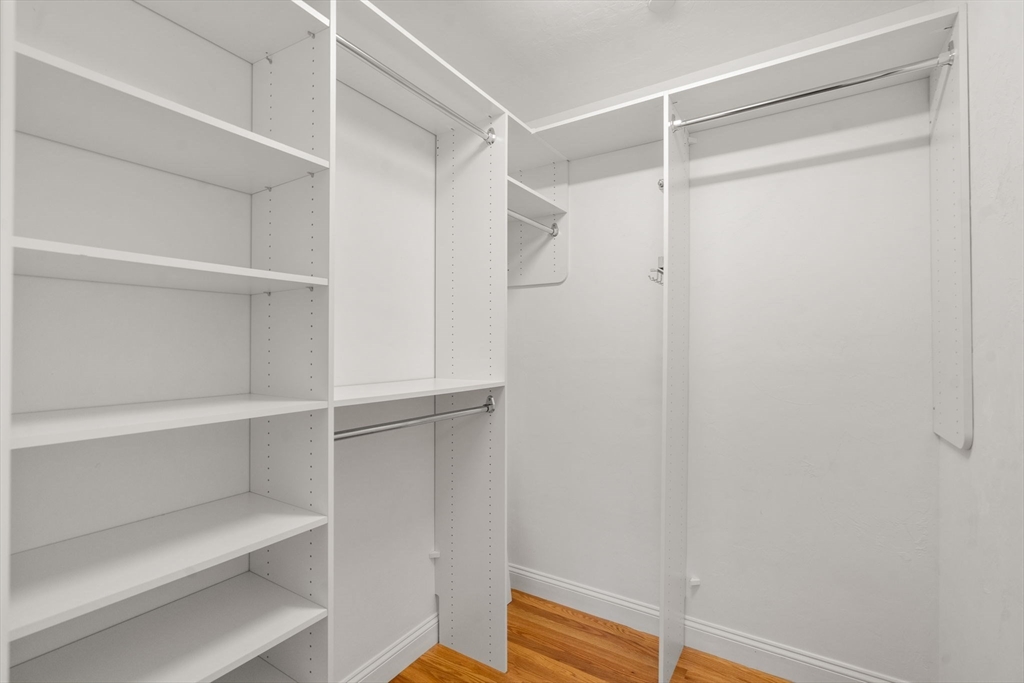 9 River Rock Way, Unit 9 Wayland, MA 01778 - Photo 19 of 39 a view of walk in closet with empty racks