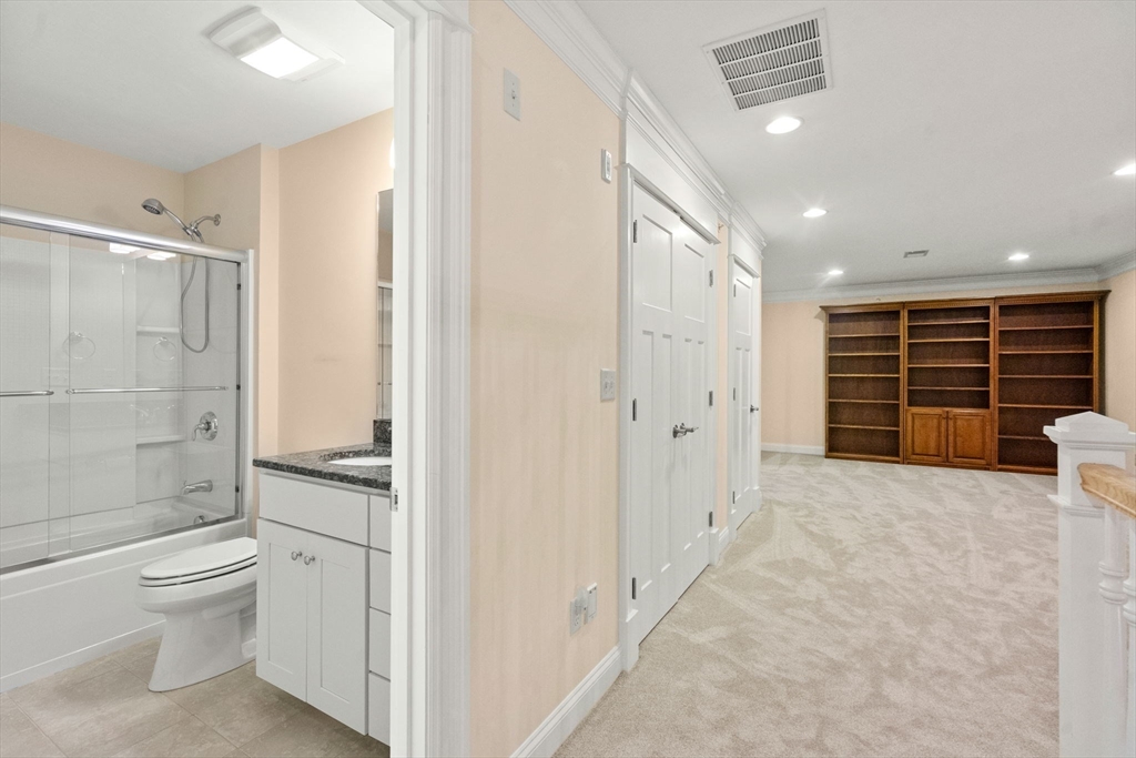 9 River Rock Way, Unit 9 Wayland, MA 01778 - Photo 25 of 39 a bathroom with a toilet and a shower