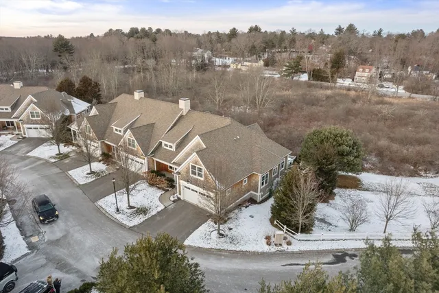 an aerial view of residential house with beach