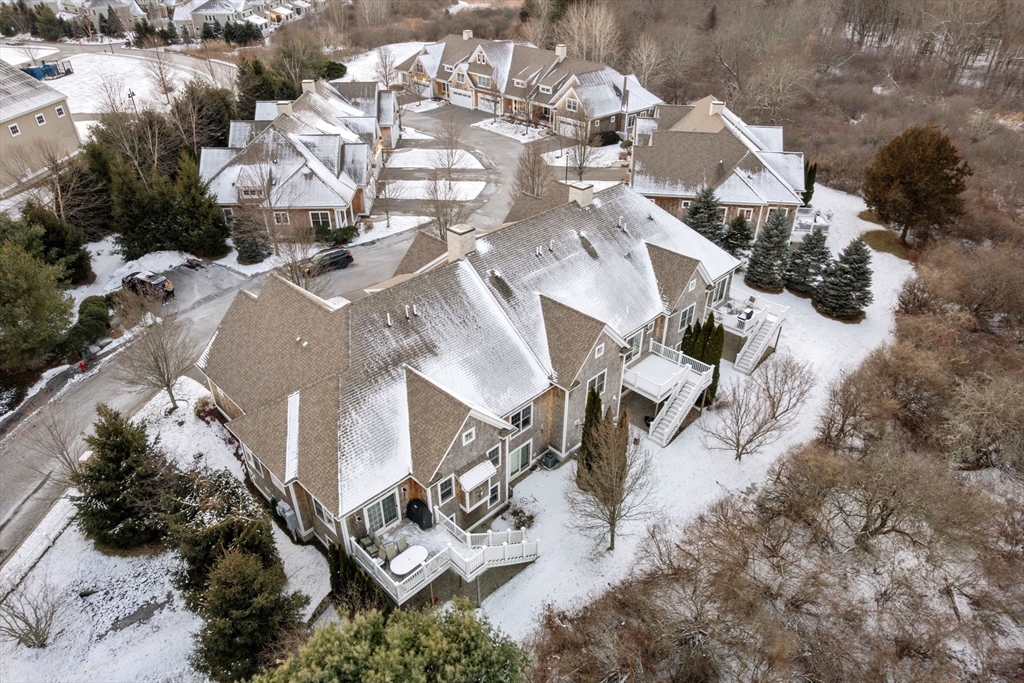 9 River Rock Way, Unit 9 Wayland, MA 01778 - Photo 39 of 39 an aerial view of residential houses with outdoor space