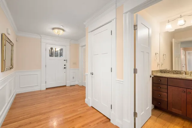 a view of a bathroom with sink and mirror