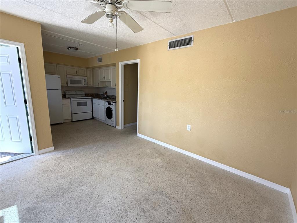 17688 Gulf Boulevard, Unit 102 Redington Shores, FL 33708 - Photo 4 of 14 a view of a livingroom with a furniture