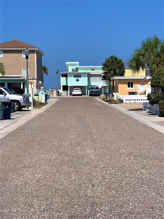 17688 Gulf Boulevard, Unit 102 Redington Shores, FL 33708 - Photo 10 of 14 a car parked in front of a building
