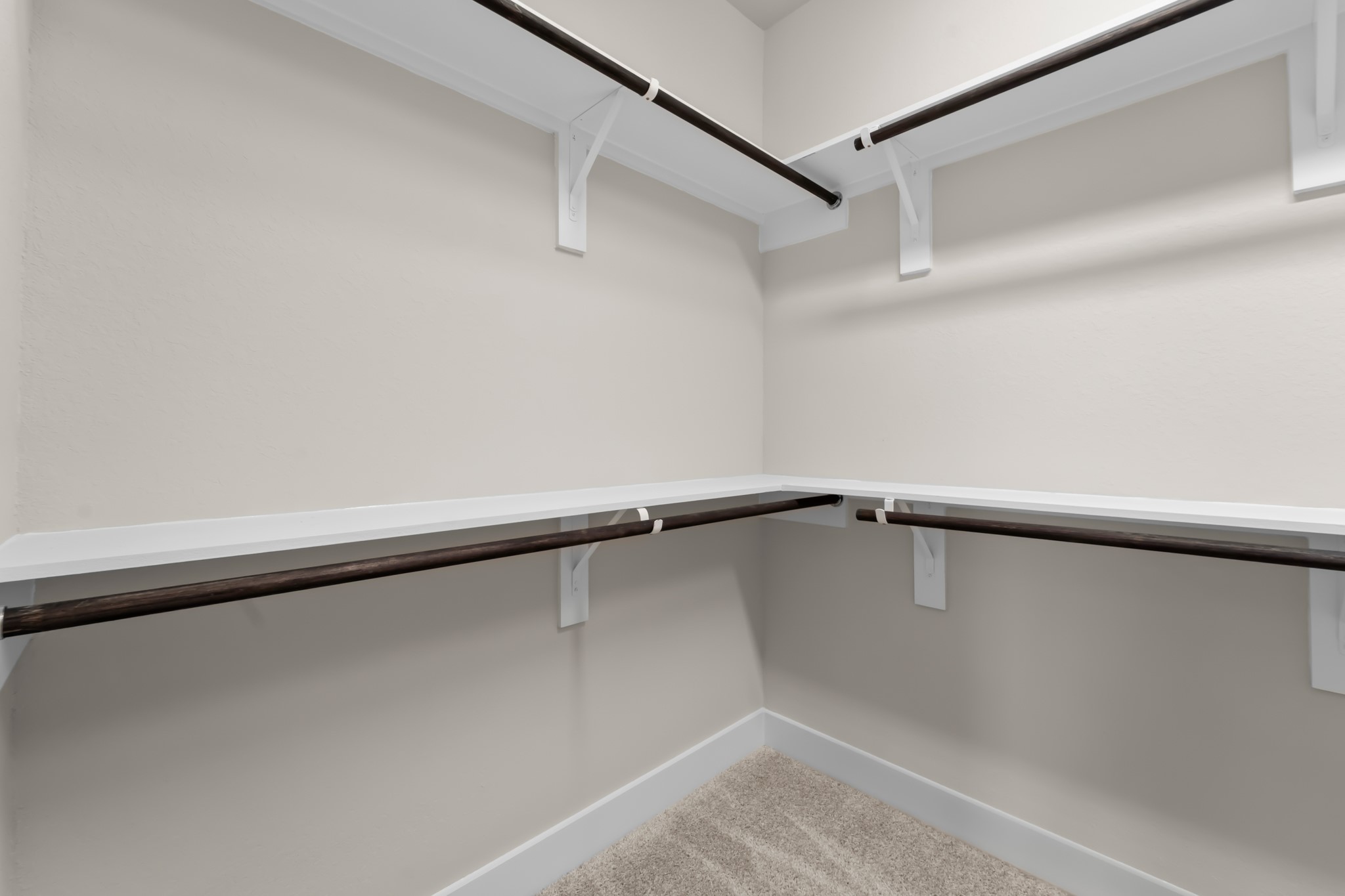 18423 Windy Knl Way Houston, TX 77084 - Photo 19 of 39 a view of an empty walk in closet