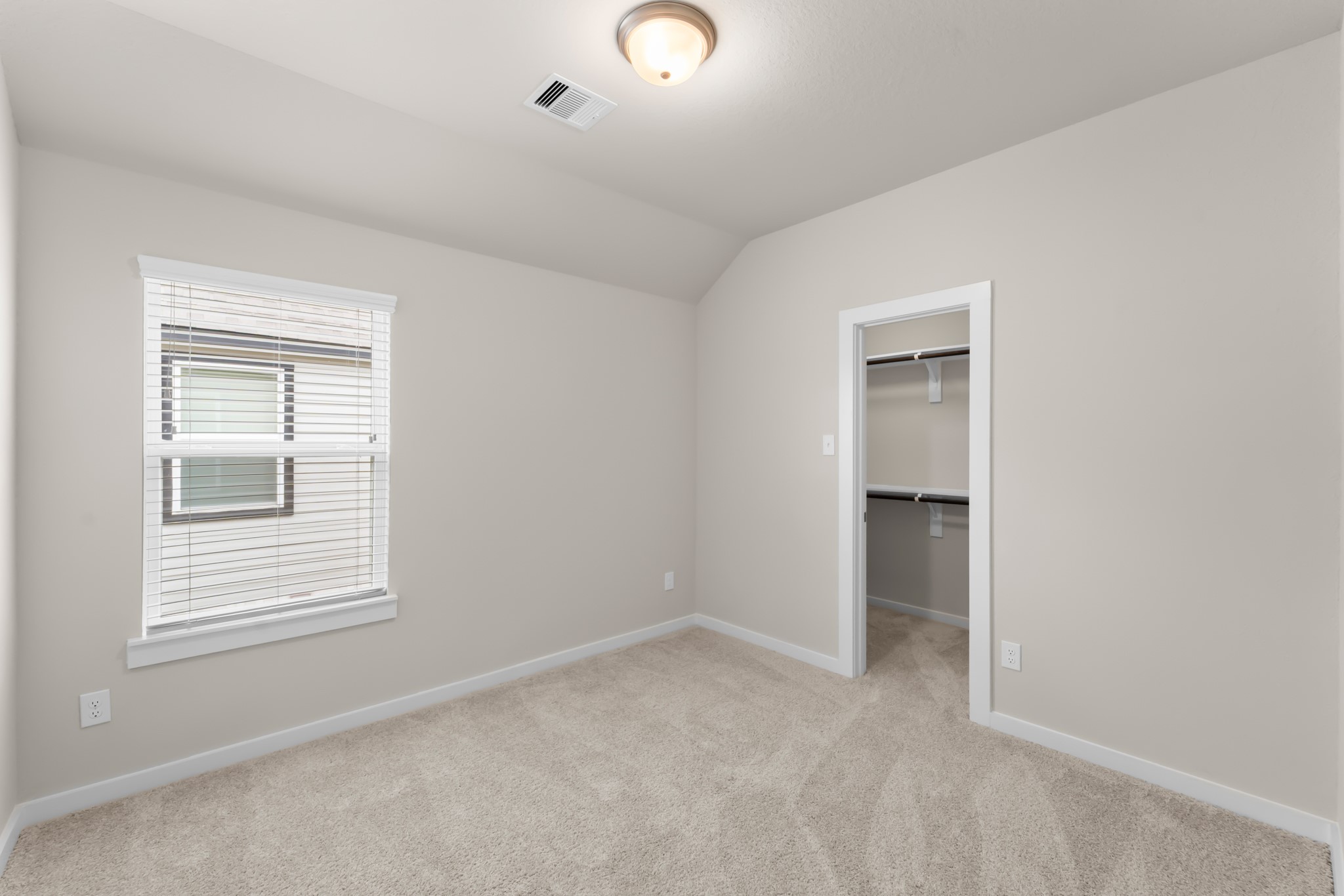 18423 Windy Knl Way Houston, TX 77084 - Photo 27 of 39 an empty room with windows and closet