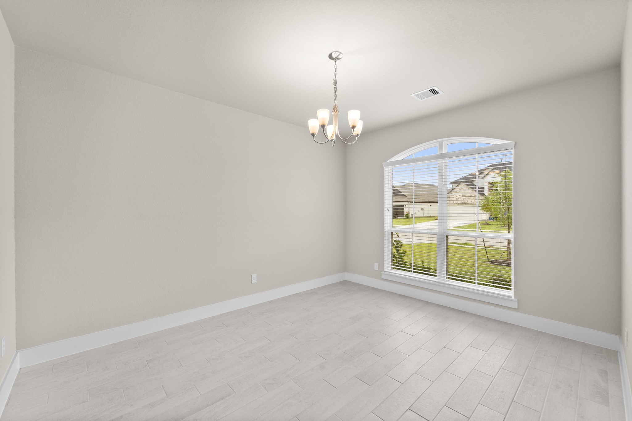 18423 Windy Knl Way Houston, TX 77084 - Photo 6 of 39 an empty room with a window