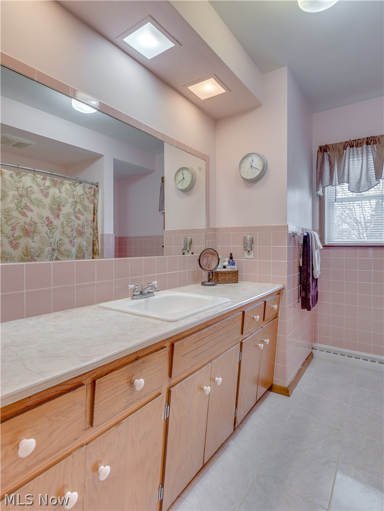 275 Lester Road New Franklin, OH 44319 - Photo 25 of 31 The full bathroom is conveniently located between the bedrooms.