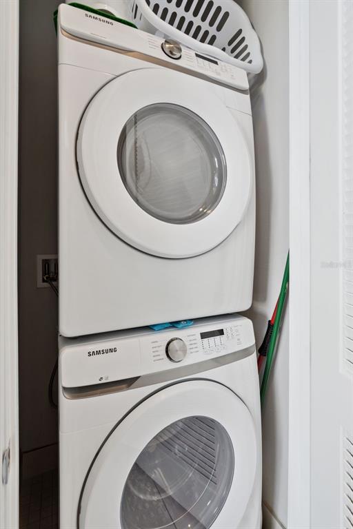 7770 Sandy Ridge Drive, Unit 223 Reunion, FL 34747 - Photo 27 of 51 a utility room with dryer and washer