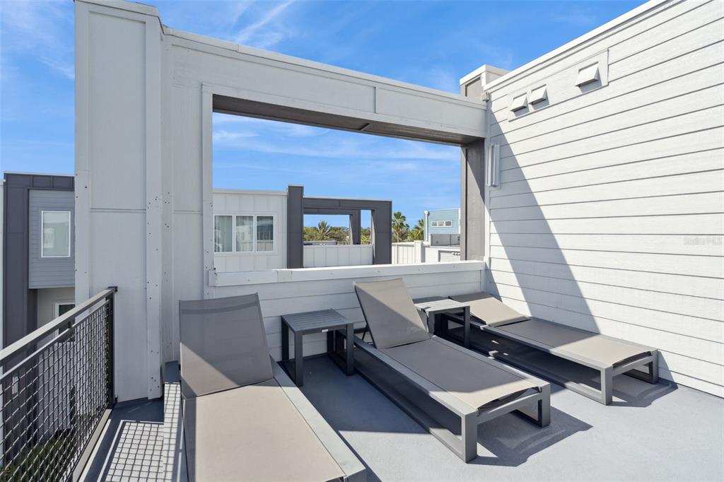 7770 Sandy Ridge Drive, Unit 223 Reunion, FL 34747 - Photo 29 of 51 a view of a patio with a table and chairs
