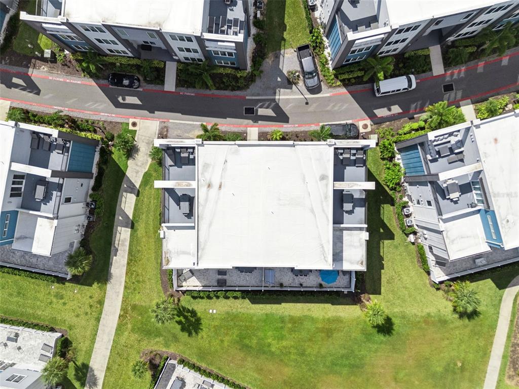 7770 Sandy Ridge Drive, Unit 223 Reunion, FL 34747 - Photo 34 of 51 an aerial view of multiple houses with yard