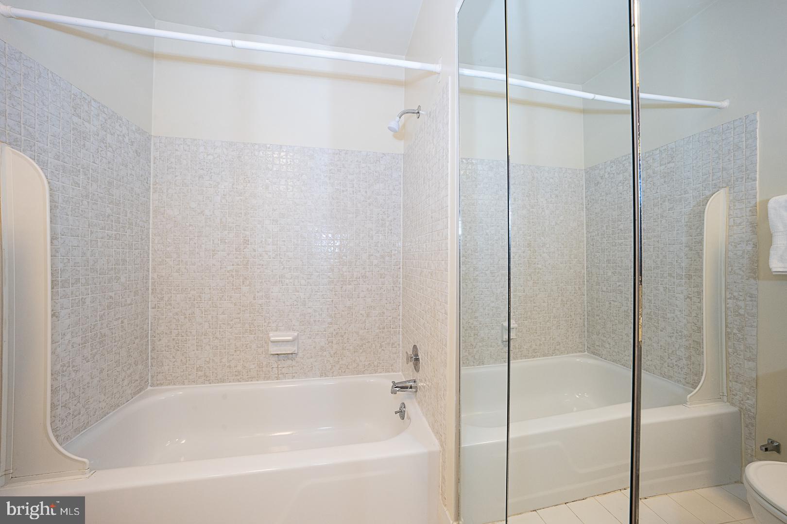 258 Old Forge Crossing Devon, PA 19333 - Photo 25 of 36 Mirrored doors open to laundry room