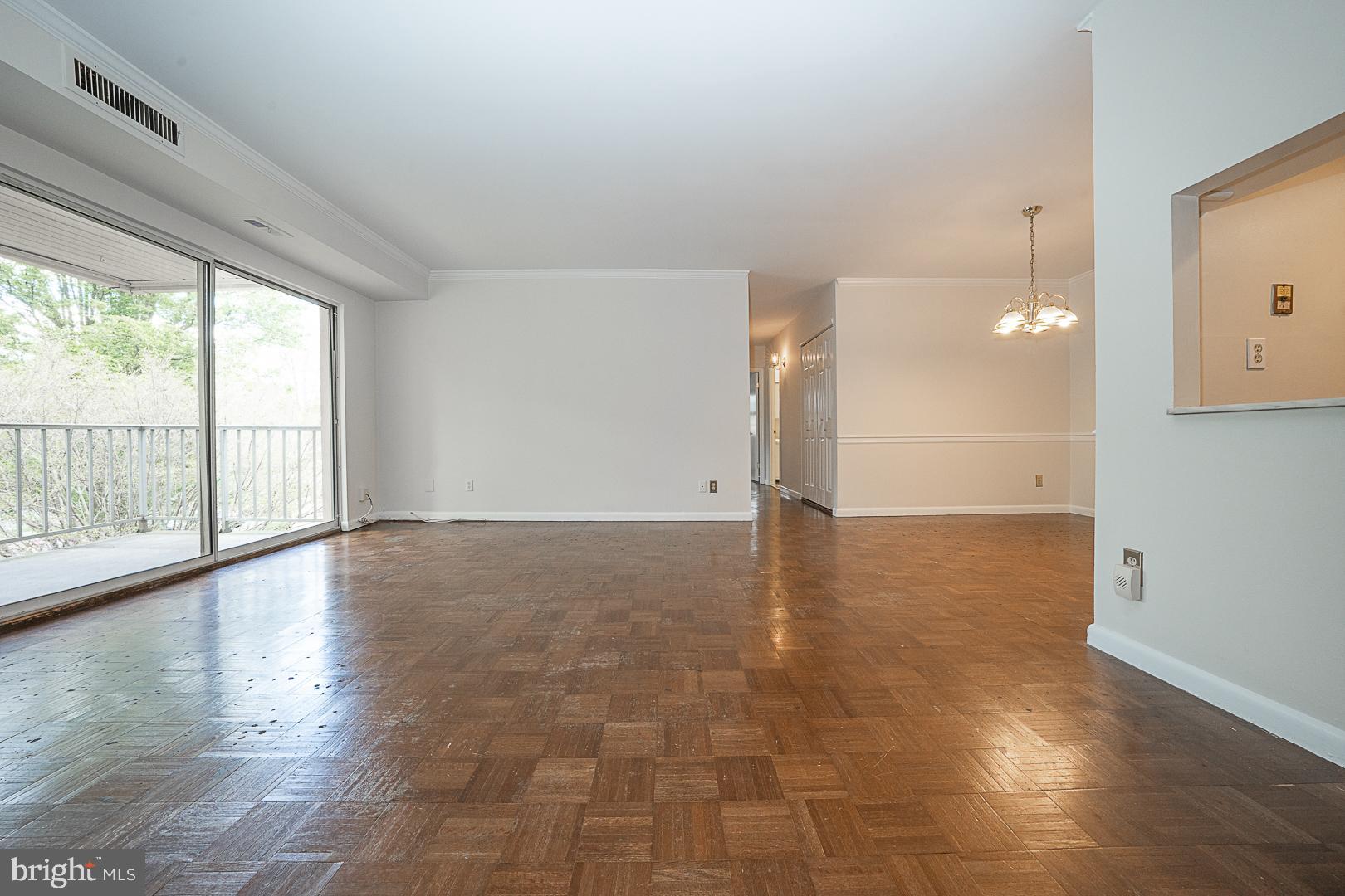 258 Old Forge Crossing Devon, PA 19333 - Photo 8 of 36 Living room with sliding doors to balcony