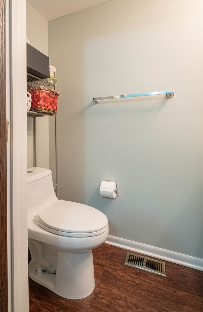335 Shadow Bend Drive Wheeling, IL 60090 - Photo 11 of 21 a bathroom with a toilet and a sink