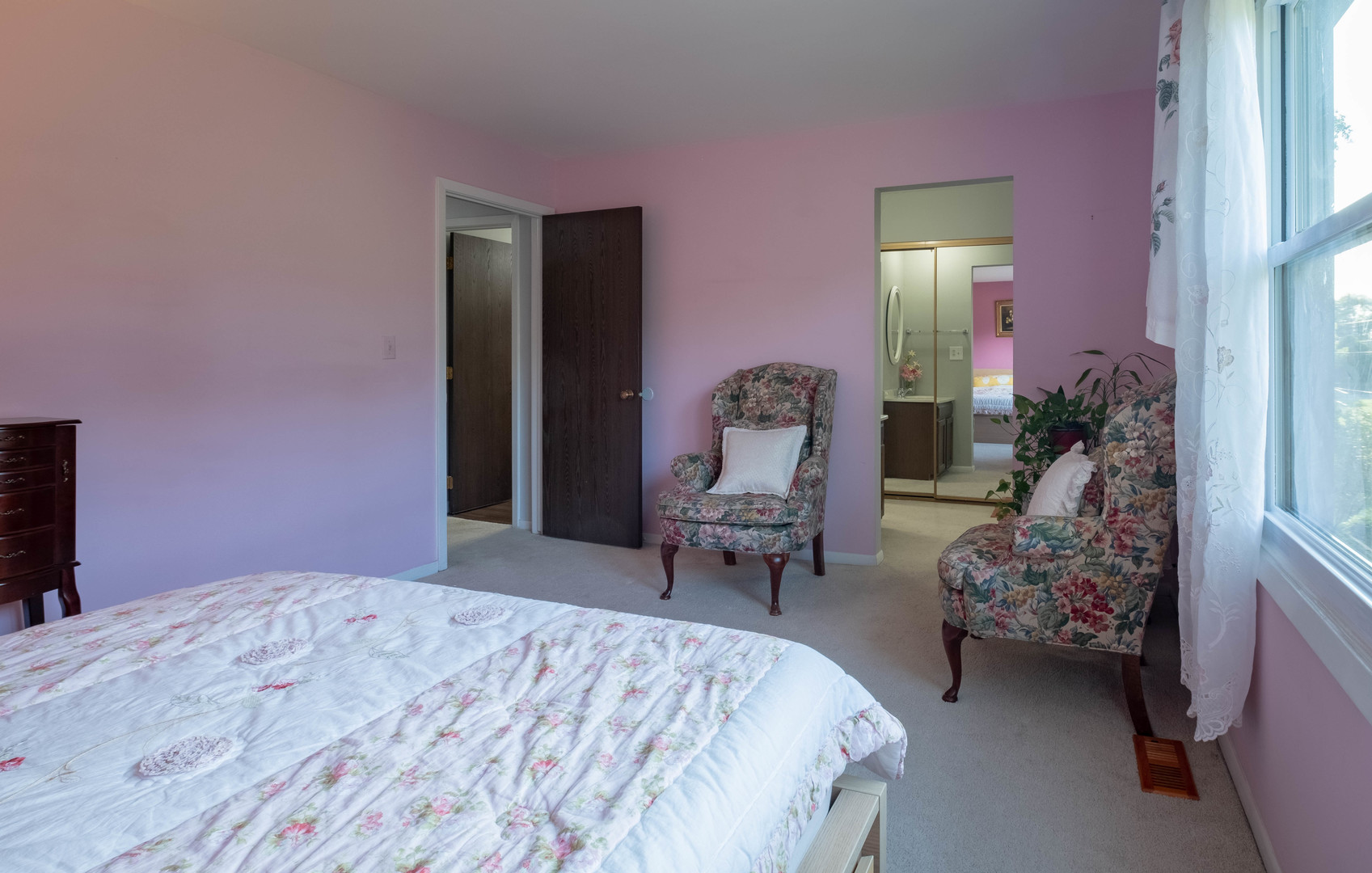 335 Shadow Bend Drive Wheeling, IL 60090 - Photo 17 of 21 a bedroom with bed and a chair
