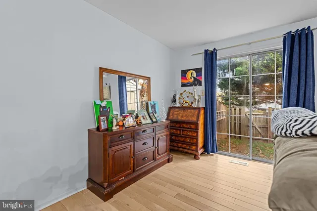 a living room with furniture and a gate