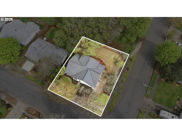 a black and white photo of a house