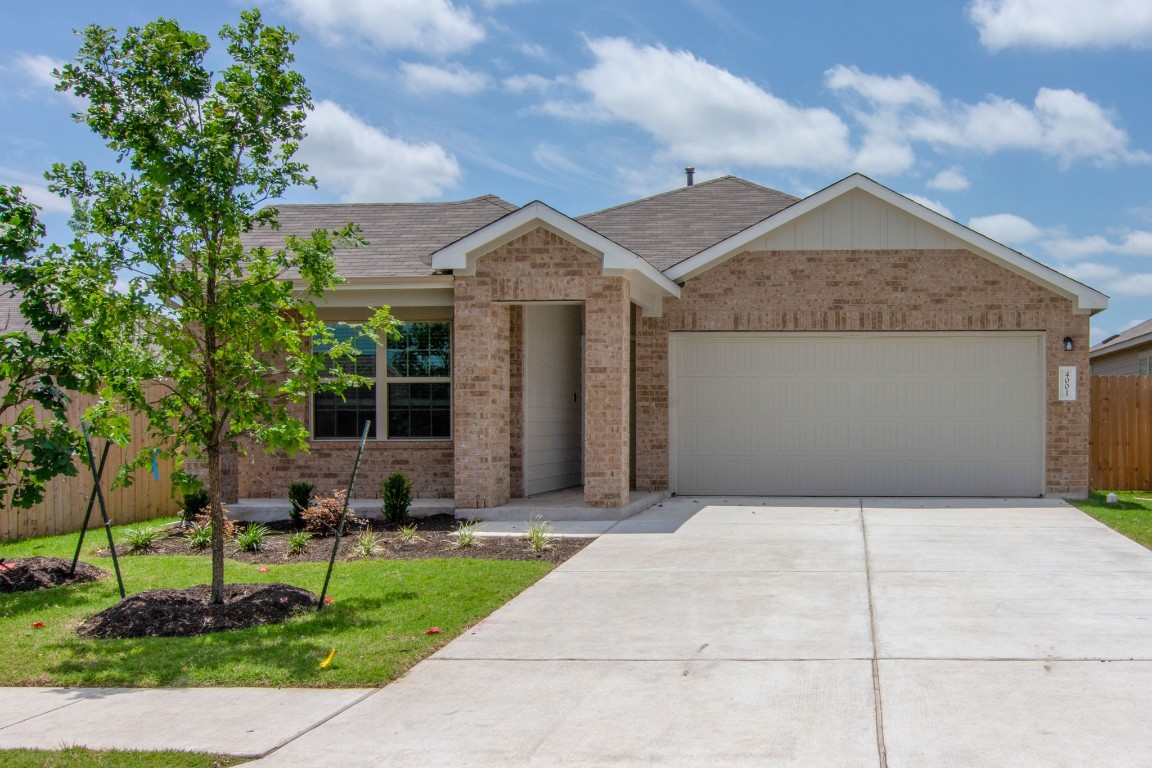 4001 Ignacio Drive Austin, TX 78744 - Photo 1 of 1 a front view of a house with garden