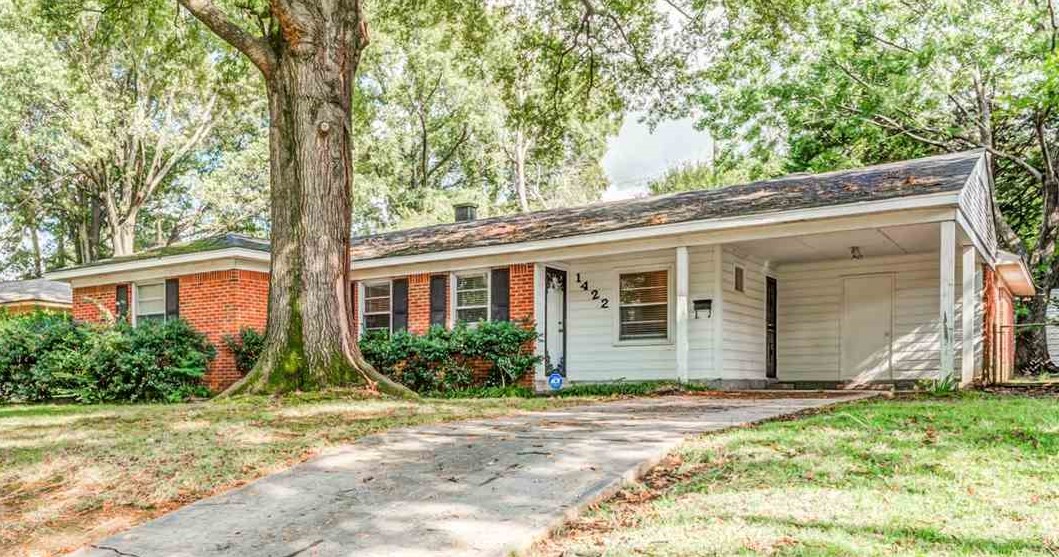 1422 Wilbec Road Memphis, TN 38117 - Photo 1 of 22 a front view of a house with garden