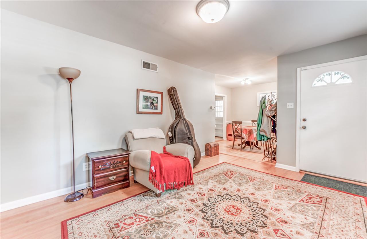 1422 Wilbec Road Memphis, TN 38117 - Photo 11 of 22 a bedroom with furniture and a wooden floor