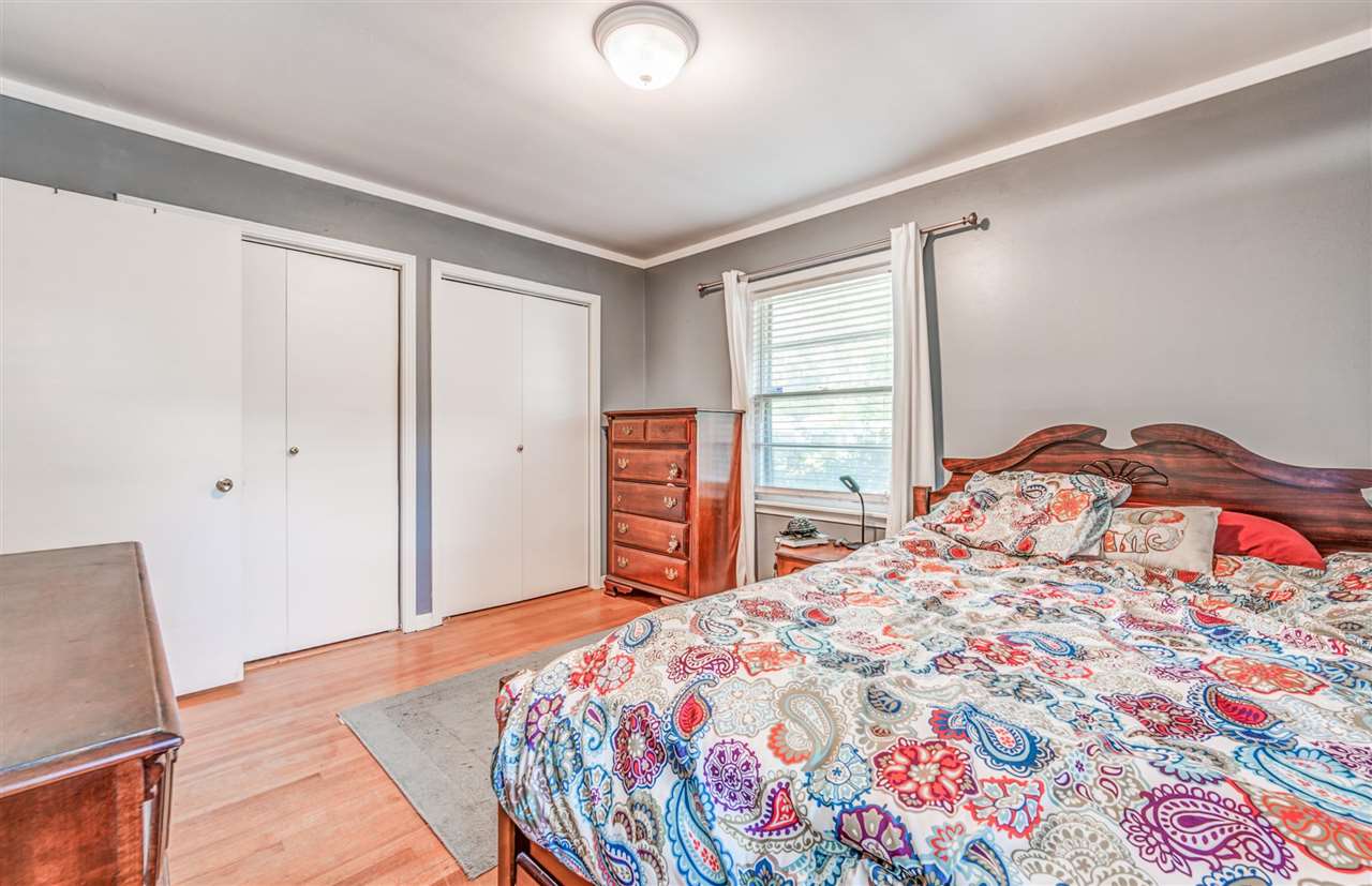 1422 Wilbec Road Memphis, TN 38117 - Photo 12 of 22 a bedroom with a bed and a dresser