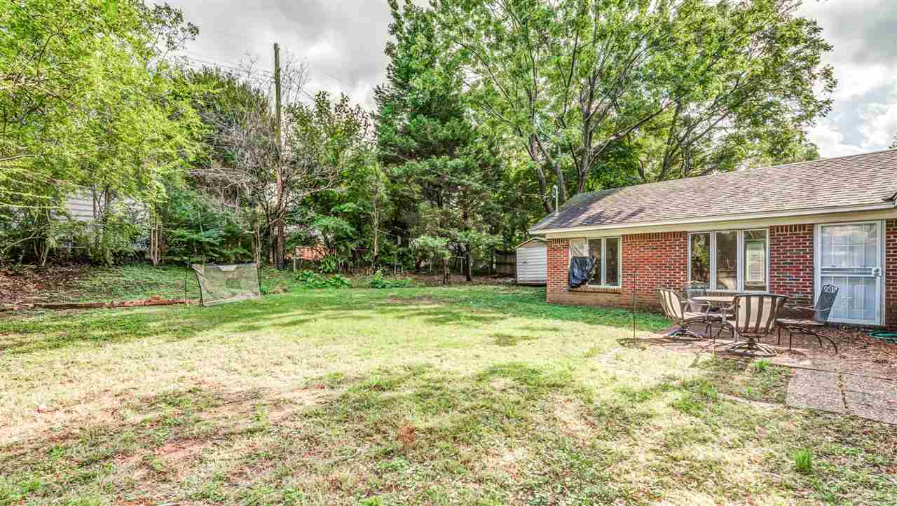 1422 Wilbec Road Memphis, TN 38117 - Photo 18 of 22 a view of house with backyard space and garden