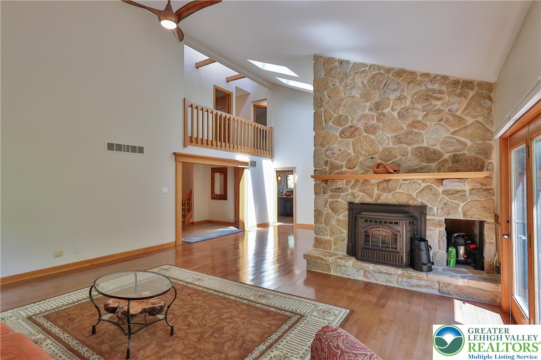 2159 Quarry Road Coopersburg, PA 18036 - Photo 20 of 79 Formal living room features stone fireplace with pellet insert
