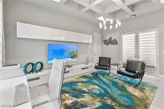 a bedroom with a bed and a potted plant